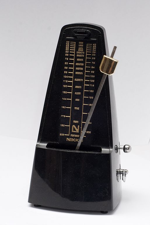 A metronome produces a periodic sound to help musicians keep rhythm. The mechanism is an inverted pendulum with a weight on the end; moving the weight up/down changes the speed of the metronome accordingly. Image © Vincent Quach/CC-BY-3.0.